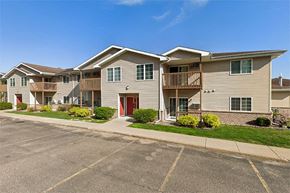 Rhinelander apartment for rent - a row of apartment buildings on the side of a street