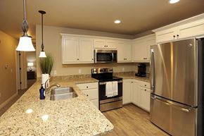 Sheboygan apartment for rent - A kitchen with granite countertops and stainless steel appliances.
