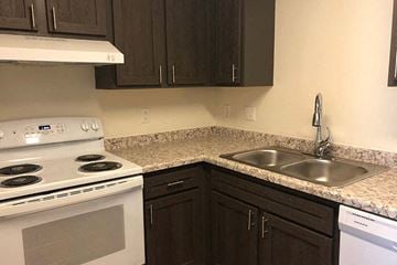 Newton apartment for rent - a kitchen with a stove and a sink