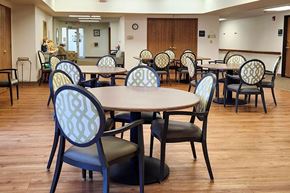 Clinton apartment for rent - A room with tables and chairs.