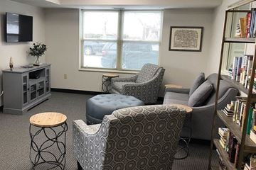 Clear Lake apartment for rent - a living room with a couch and chairs and a tv