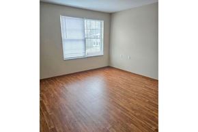 South Charleston apartment for rent - Empty room with wooden floor and a window.
