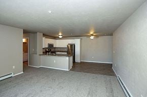 Oconto apartment for rent - an empty living room with a kitchen and