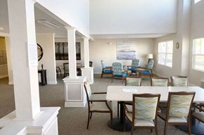 Hopkinsville apartment for rent - A white dining room with a table and chairs.