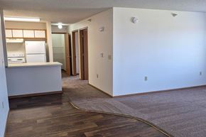 Iowa Falls apartment for rent - A kitchen with white appliances and a white countertop.