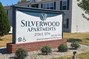 Winfield apartment for rent - A sign for Silverwood Apartments with a wheelchair symbol indicating accessibility.