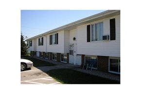 Sturgeon Bay apartment for rent - an apartment building with a car parked in front of it