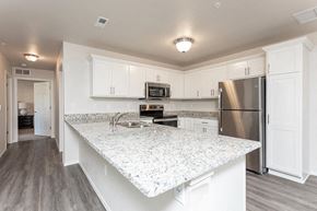 Waterford apartment for rent - a large kitchen with a marble counter top