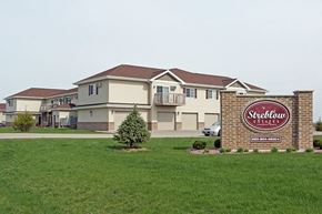 Fond Du Lac apartment for rent - A Strelbow Estates sign is in front of a house.