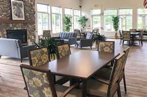 Woodruff apartment for rent - a dining room with a table and chairs and a fireplace