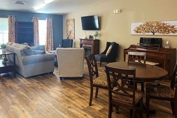 Bismarck apartment for rent - a living room with a table and a couch and a tv