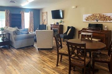 Bismarck apartment for rent - a living room with a table and a couch and a tv