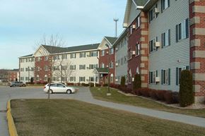 Green Bay apartment for rent - a white car parked in front of an apartment building