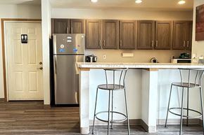 Quincy apartment for rent - A kitchen with a white fridge and a white counter top.