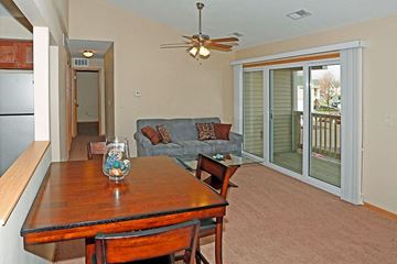 Port Huron apartment for rent - a living room with a dining table and a couch
