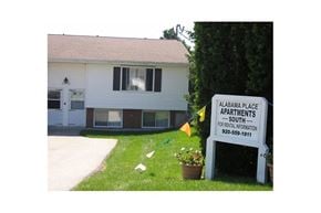 Sturgeon Bay apartment for rent - a white house with a sign in front of it