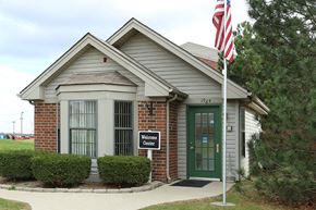 Greenville apartment for rent - a house with an flag in front of it