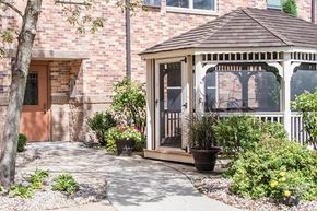 Clear Lake apartment for rent - a porch with a gazebo in front of a brick house