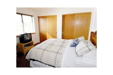 Lomira apartment for rent - a bedroom with a bed and a tv