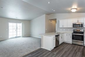 Jackson apartment for rent - an empty kitchen with a stove and a sink