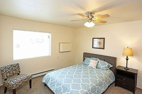 Horicon apartment for rent - a bedroom with a bed and a ceiling fan