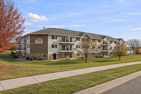 St. Cloud apartment for rent - Apartment building with the letters SH on the front.