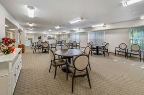 Creston apartment for rent - A dining room with a round table and chairs.