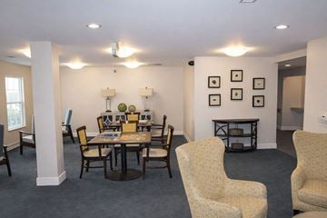 Port Huron apartment for rent - A dining room with a table set for six.