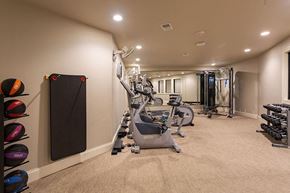Oconomowoc apartment for rent - A well-equipped gym with a variety of exercise machines and weights.