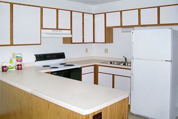 Green Bay apartment for rent - a kitchen with a stove and a refrigerator