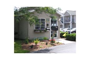 Sheboygan Falls apartment for rent - A building with a sign that says "Evergreen" on it.