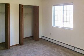Chilton apartment for rent - an empty room with a window and a door