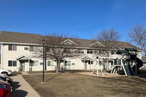 Marshall apartment for rent - a house with a playground in front of it