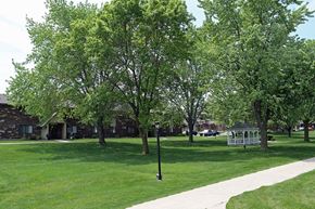 Fond Du Lac apartment for rent - a park with trees and a gazebo in the grass