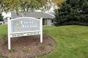 Elkhorn apartment for rent - a sign for first avenue apartments in front of a house