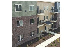 Viroqua apartment for rent - an aerial view of a brick building with balconies