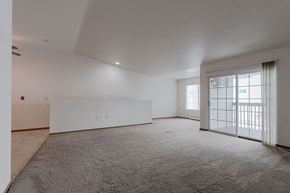Ripon apartment for rent - an empty living room with a large glass door