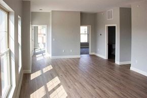 Charles City apartment for rent - an empty living room with a hard wood floor