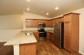 Hartford apartment for rent - a kitchen with a counter top and a refrigerator