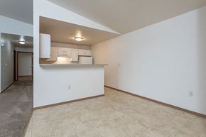 Ripon apartment for rent - an empty living room and kitchen with a counter