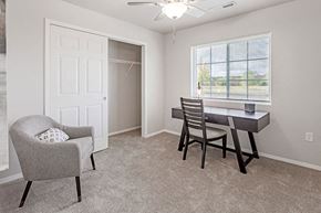 Merrill apartment for rent - a dining room with a table and chairs