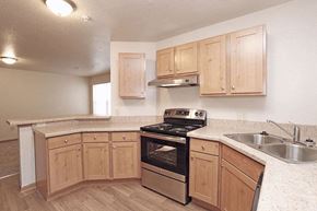 Fairmont apartment for rent - a kitchen with a stove and a sink