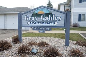 Albert Lea apartment for rent - a sign for gray gables apartments in front of a house