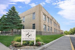 Hartford City apartment for rent - A building with a sign that says Hartford Square.