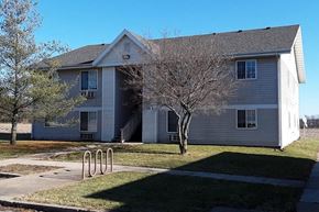 Winfield apartment for rent - a white house with a playground in front of it