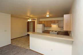 Platteville apartment for rent - an empty kitchen with a white counter top