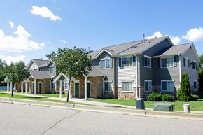 Kalamazoo apartment for rent - a row of houses on the side of a street