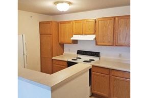Hartford apartment for rent - a kitchen with a stove and a refrigerator