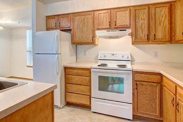 Portage apartment for rent - a kitchen with a stove and a refrigerator