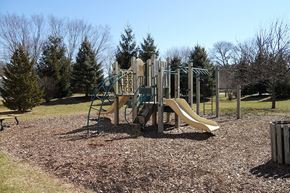 Richland Center apartment for rent - A playground with a slide and a climbing frame.